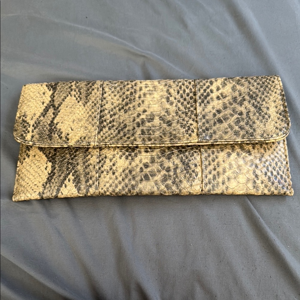 Urban Expressions snake print material clutch in tan and black!
